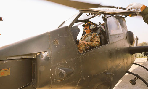 COAS going for an aerial view of offensive manoeuvres onboard a combat attack helicopter.—ISPR photo