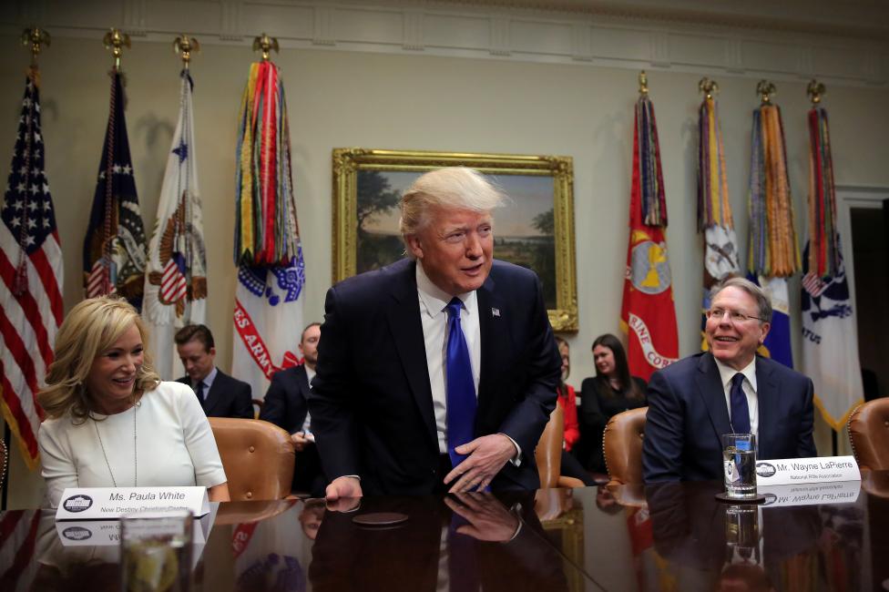 DAY 13 / FEBRUARY 1: President Donald Trump met with Wayne LaPierre (R), executive vice president of the National Rifle Association and Paula White (L) from the New Christian Destiny Center regarding the Supreme Court nomination of Neil Gorsuch. Trump later urged Senate Republicans to "go nuclear" and impose a rule change to force a simple majority vote on confirmation if Democrats block his nominee. Trump