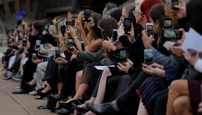 Audience members during the show by local designer Dion Lee. REUTERS/Jason Reed