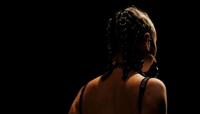 Metal rings are featured in the hair design of a model, during a show by Sass & Bide. REUTERS/Jason Reed