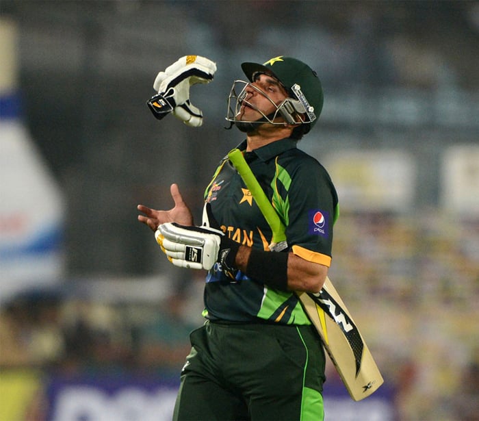 Run out for the second match in a row, India v Pakistan, Asia Cup, Mirpur, March 2, 2014/AFP