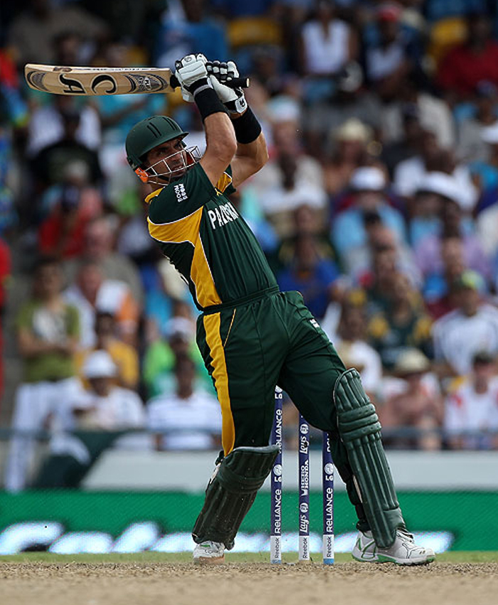 Smashing a Stuart Broad free hit for six, England v Pakistan, World T20, Barbados, May 6, 2010/Getty Images