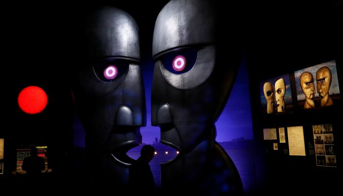 Visitors are silhouetted at The Pink Floyd Exhibition: Their Mortal Remains at the V&A Museum in London, Britain May 9, 2017. REUTERS/Stefan Wermuth