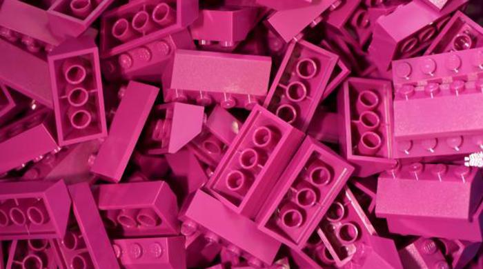 Lego sticks to bricks, despite apps, games and flicks