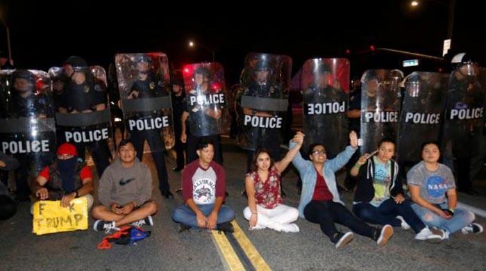 About 20 demonstrators arrested outside of Trump rally in California