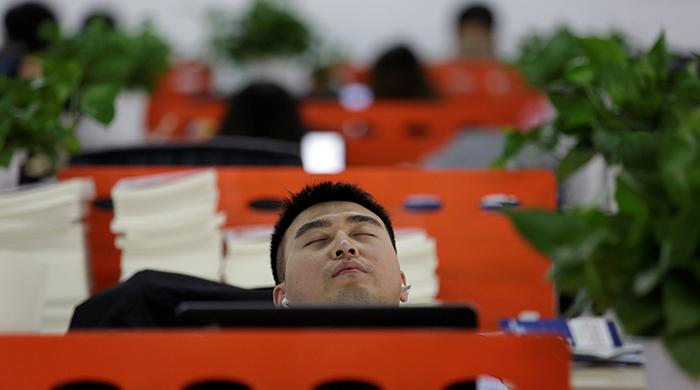 China tech workers asleep on the job, with the boss’s blessing