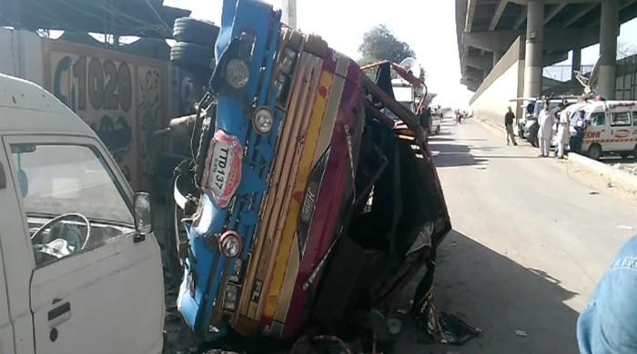 Water tanker falls from bridge in Karachi