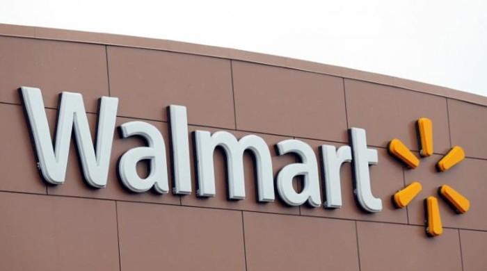 Wal-Mart to tear down walls between store, online buying operations - sources