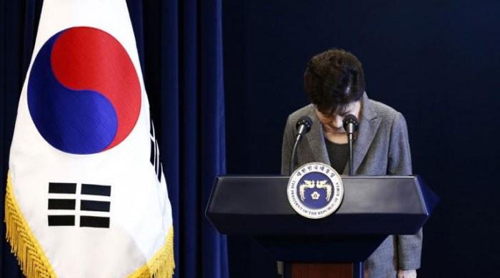 South Korean court throws president out of office, two die in protest