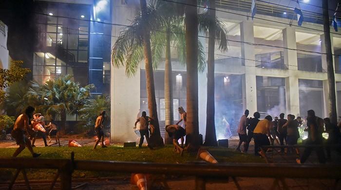 Image result for Protesters set fire to Paraguay Congress building Friday March 31,2017