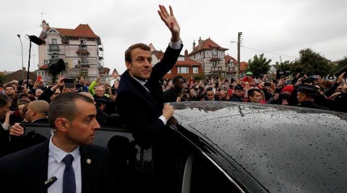 Louvre grounds, where Macron due to speak, briefly evacuated