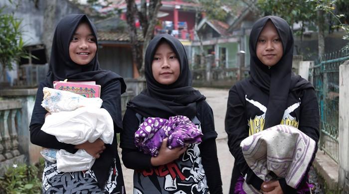 Indonesian All-girl Muslim Metal Band 'Voice Of Baceprot' Challenges ...