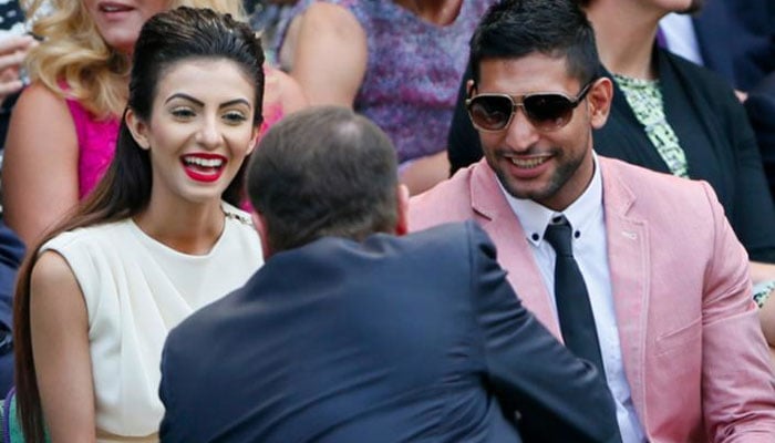 British Pakistani boxer Amir Khan (right) pictured alongside his wife Faryal Makhdoom. — Reuters/File