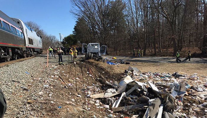 Train carrying US lawmakers hits garbage truck, injuries reported