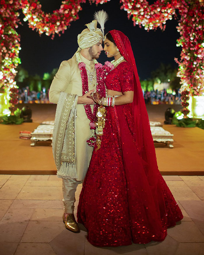 See Priyanka Chopra and Nick Jonas' High-Fashion Family Wedding Photo