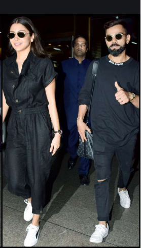 Anushka Sharma and Virat Kohli serve couple fashion goals with twinning  airport look - Video