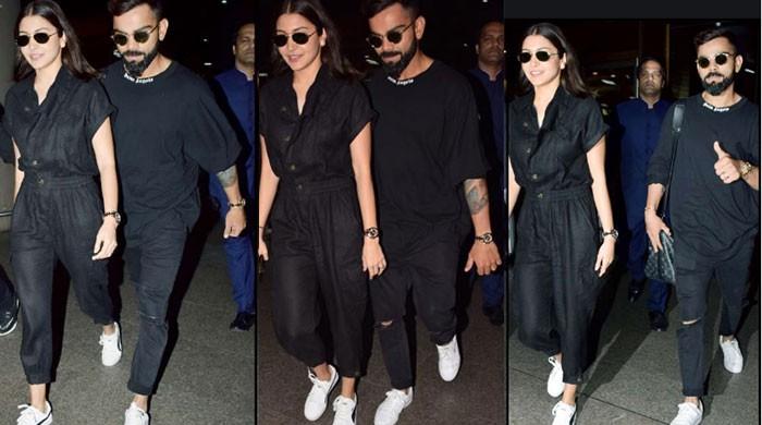 Anushka Sharma and Virat Kohli serve couple fashion goals with twinning  airport look - Video