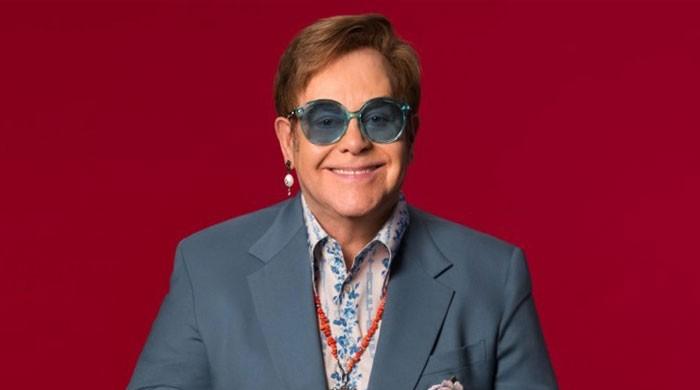 Elton John Casually Tossed A $4,000 Gucci Bag Out The Plane And I