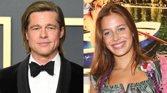 Brad Pitt snapped boarding private jet with German model Nicole Poturalski