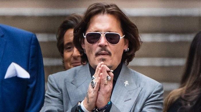 Johnny Depp accepts award from behind bars in his latest photo