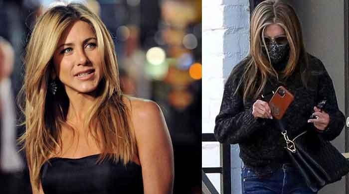 Jennifer Aniston Wears Black Sweater With Jeans at Hair Salon in LA