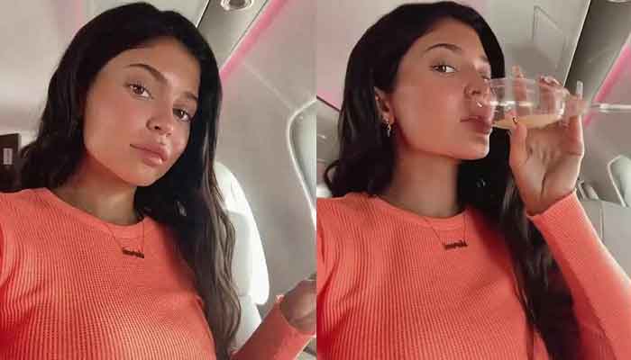 Kylie Jenner Jets Off in Neon Crop Top, Sweats & Off-White Air