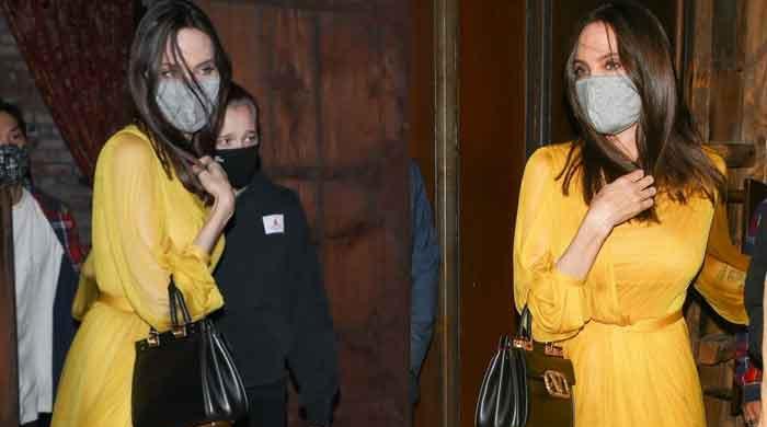 Angelina Jolie sends pulses racing as she steps out in yellow dress ...