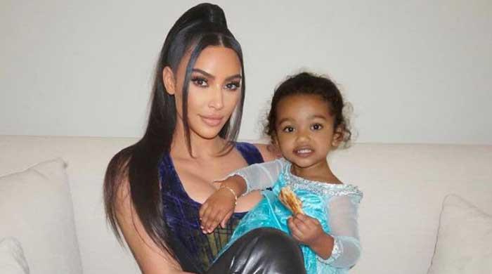 Kim Kardashian's baby girl shows she has a love for all handbags