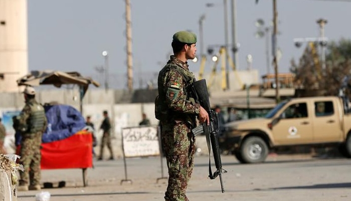 Afghan National Army (ANA) soldiers keep watch outside the Bagram Airfield entrance gate, after an explosion at the NATO air base, north of Kabul, Afghanistan November 12, 2016. Reuters/File