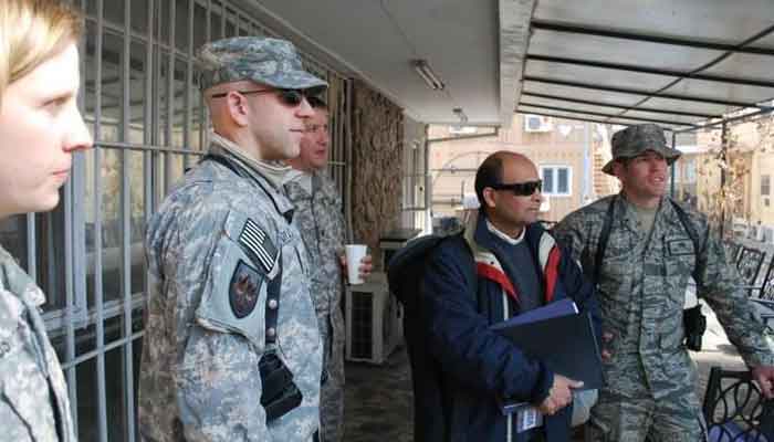 The author (2nd R) photographed with American troops at the Bagram base, in Kabul, Afghanistan, January 2012. — Photo provided by author