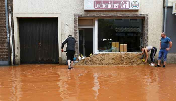 A street is flooded following heavy rainfalls in Erftstadt, Germany, July 16, 2021. — Reuters/Thilo Schmuelgen