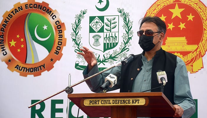 Federal Minister for Planning, Development, and Special Initiatives Asad Umar addressing a ceremony in Karachi, on April 4, 2021. — APP/File