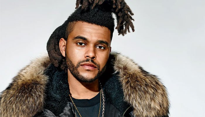The Weeknd's Thankful To Ditch Red Suit After A Year 