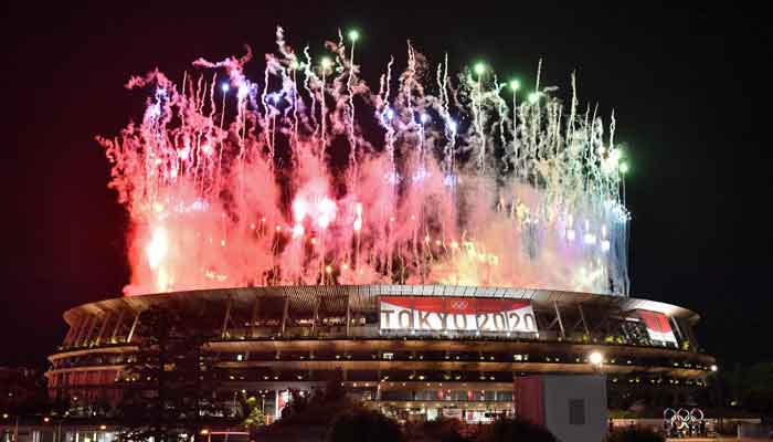 Fireworks go off around the Olympic Stadium during the closing ceremony of the Tokyo 2020 Olympic Games, as seen from outside the venue in Tokyo on August 8, 2021. — Photo by Kazuhiro Nogi/AFP