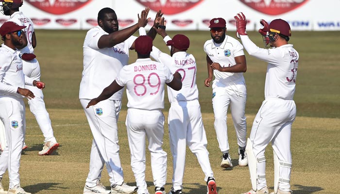 The West Indies Test team celebrating after taking a wicket. —  CWI