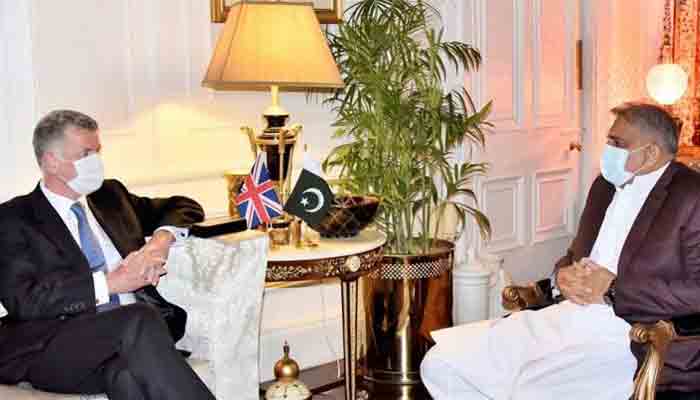 Chief of Secret Intelligence Service, UK Richard Moore meets Pakistan Army chief General Qamar Javed Bajwa. Photo: Radio Pakistan