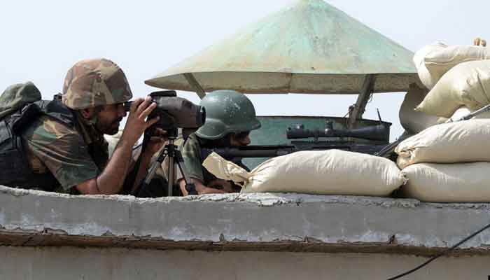 Pakistan Army soldiers take position at a post in North Waziristan in this AFP file photo.