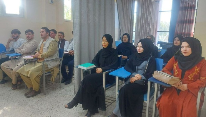 Students attend class under new classroom conditions at Avicenna University in Kabul, Afghanistan September 6, 2021, in this picture obtained by REUTERS from social media. Social media handout/via REUTERS