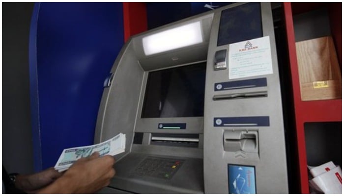 Photo of an ATM machine — AFP.