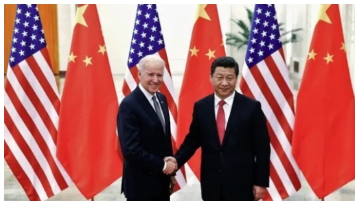 US President Joe Biden shakes hands with Chinese President Xi Jinping. Photo: Reuters