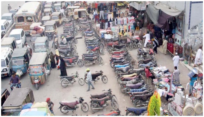 An illegal charged parking site at the Liaquatabad Supermarket. Photo — Online