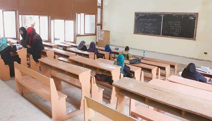 A Karachi University classroom is seen largely empty in this Online file photo.