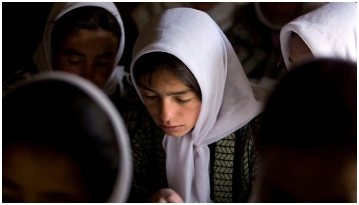 Afghan girls attend a class at the Ishkashim high school for girls in the northeastern province of Badakhshan, near the border with Tajikistan, Afghanistan Apr 23, 2008. REUTERS