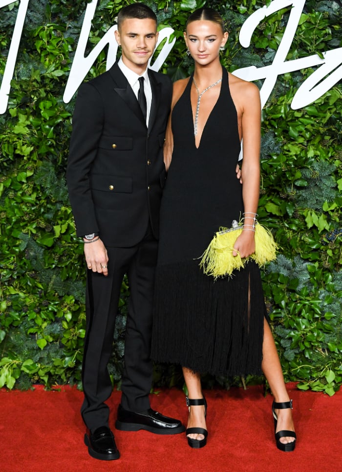 Romeo Beckham makes stylish red carpet debut with model girlfriend