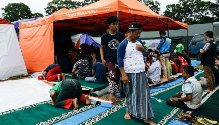 Indonesian Muslims gathered for Friday prayers in an evacuation centre on the slopes of Mount Semeru. File: Reuters