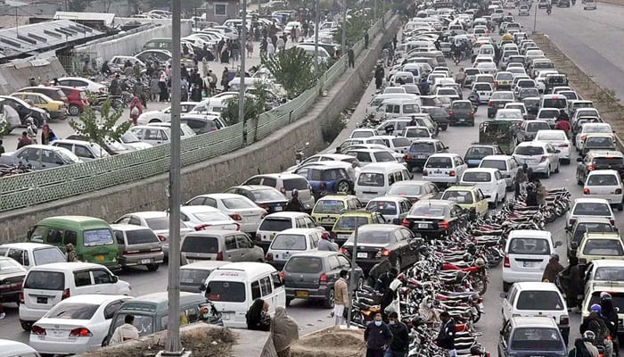 This file photo shows a view of a massive traffic jam near H-9. — APP