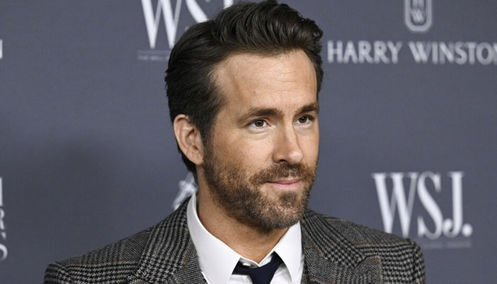 Ryan Reynolds raises £10,000 for a footballer after his baby's tragic death