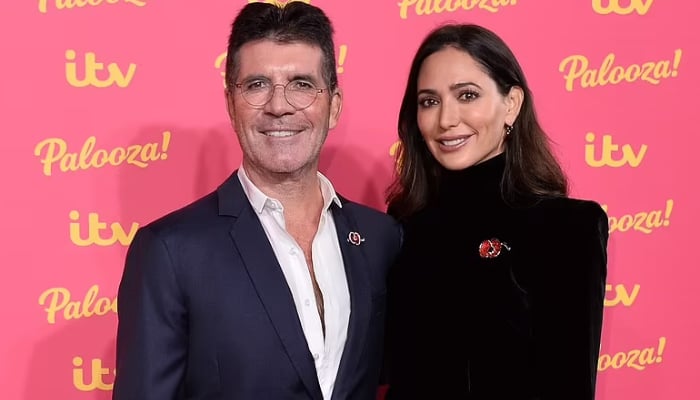 Simon Cowell is engaged to his girlfriend Lauren Silverman after dating her for almost 10 years