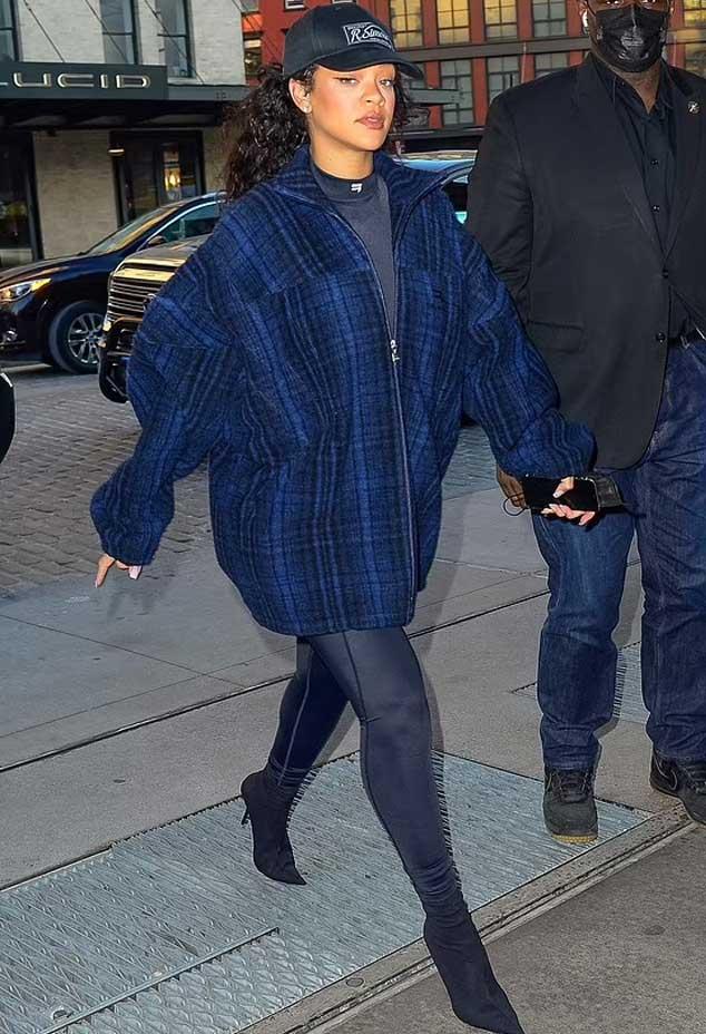 rihanna looks stunning a black shirt with matching leggings and heels while  stepping out for dinner in new york city-051122_9