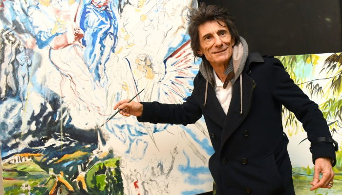 Ronnie Wood has unveiled his latest work of art — a giant abstract painting of the Rolling Stones